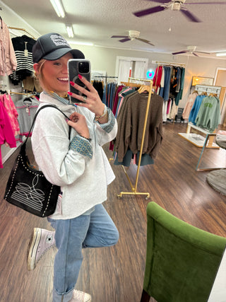 Black suede leather purse with white bootstitch 