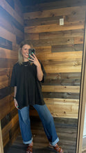 Load image into Gallery viewer, Oversized mineral wash tee paired with jeans on model